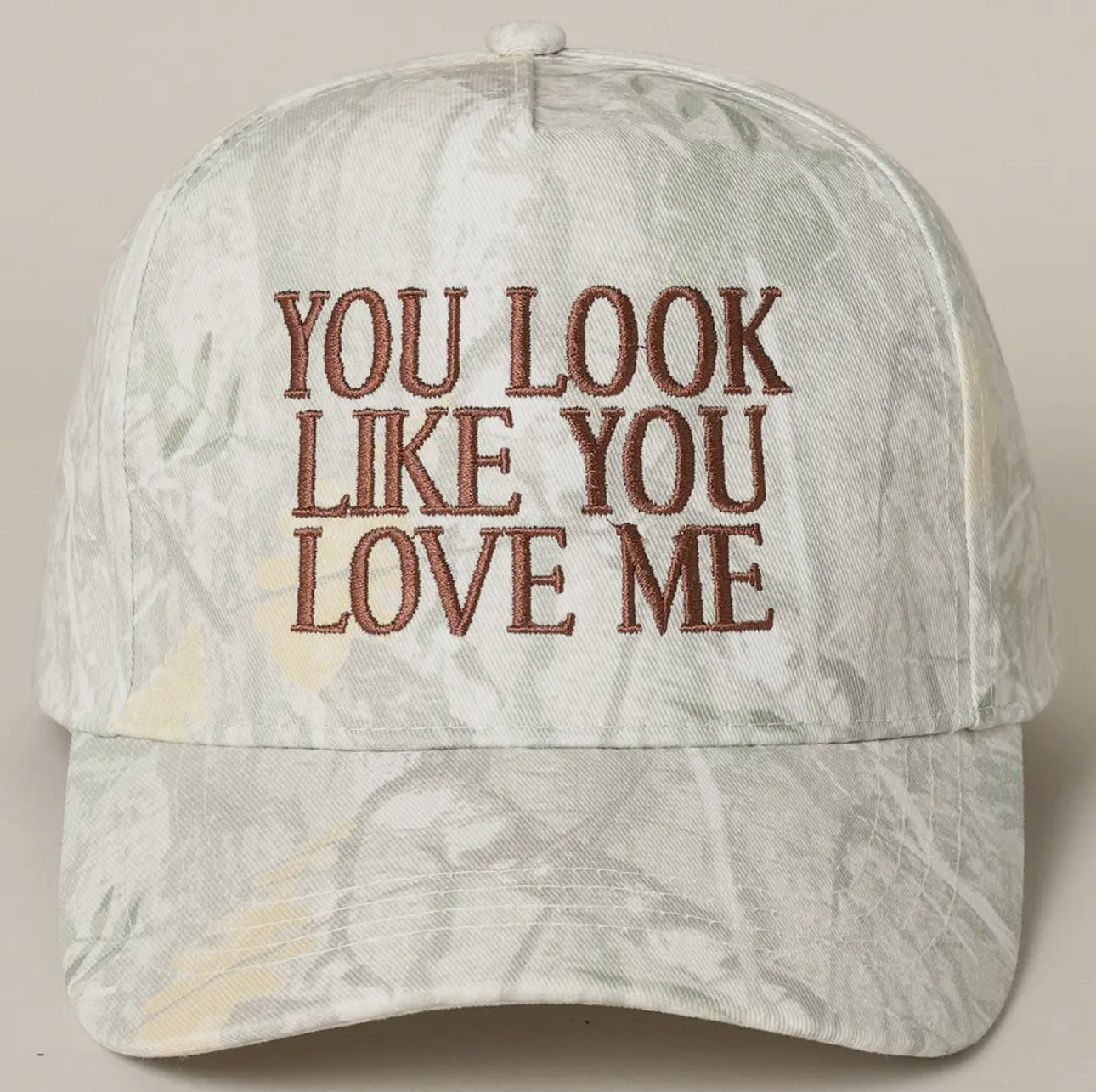 Trendy camo trucker hat with embroidered 'You Look Like ou Love Me' Design